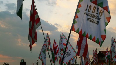 Supporters wave flags of Jobbik, an anti-Semitic Hungarian political party | CC via flickr user Leigh Phillips