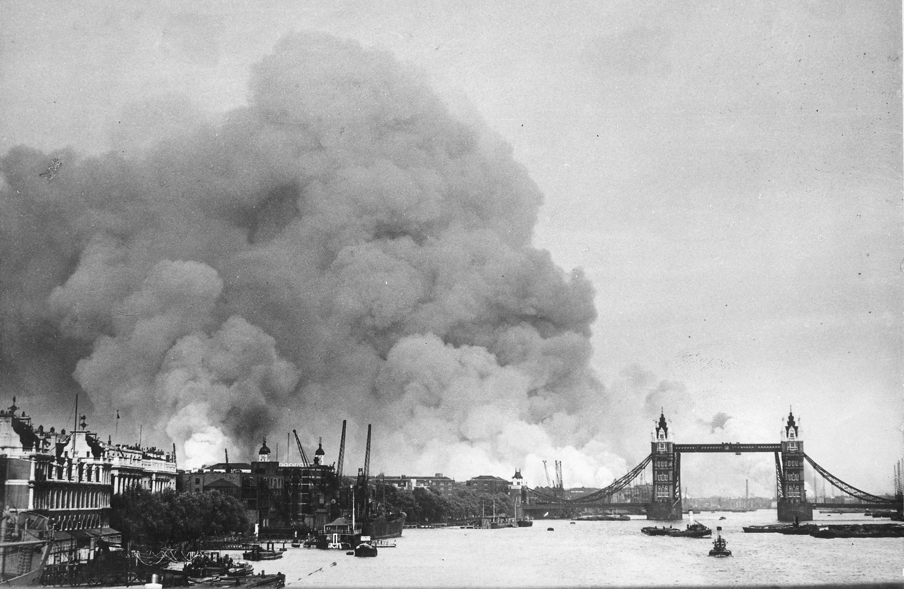 Smoke rising from fires in Surrey docks, London, following German bombing on  September 7, 1940 | CC via Wikimedia Commons
