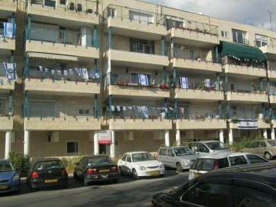 A typical Jerusalem apartment complex on Yom HaAtzmat, Photo by DMK.