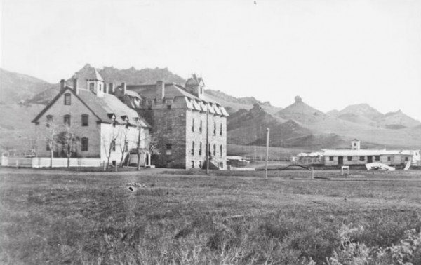 St. Peter's Mission near Cascade, Montana. The mission included a boarding school where Piegan Blackfeet children from a nearby reservation were sent. | By Unknown photographer [Public domain], via Wikimedia Commons.