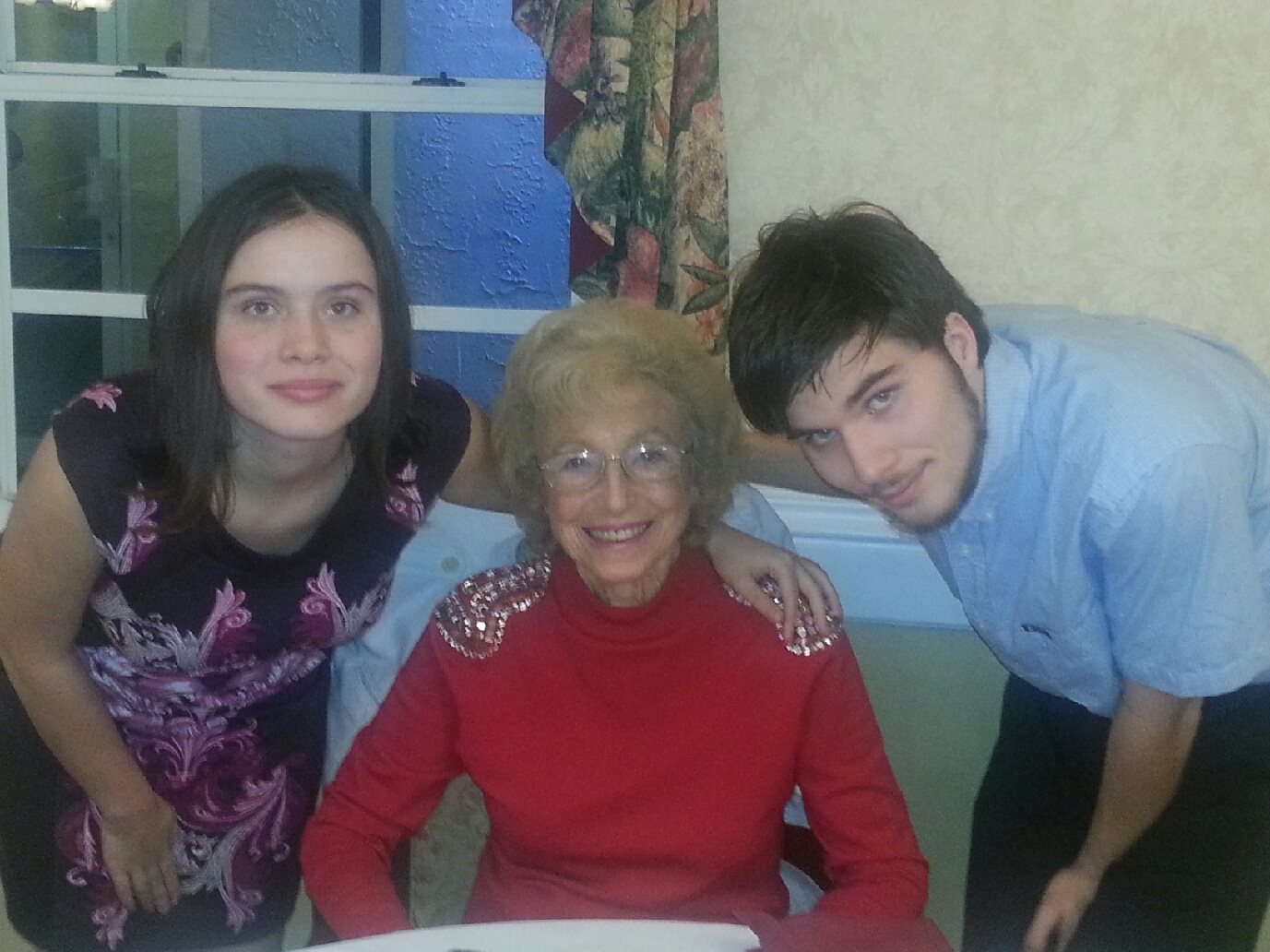 The author, left, with her grandmother and brother.