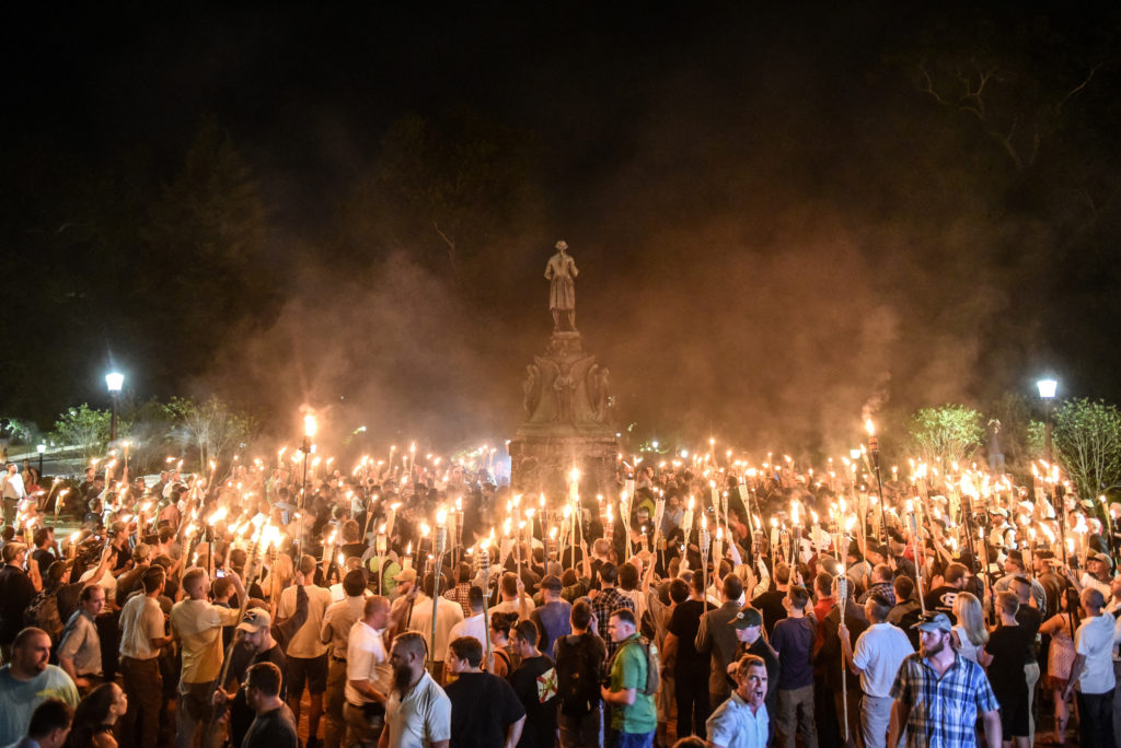 White nationalists participate in a torch-lit march on the grounds of the University of Virginia ahead of the Unite the Right Rally in Charlottesville, Virginia on August 11, 2017. Picture taken August 11, 2017.  REUTERS/Stephanie Keith - RC12CB996CB0