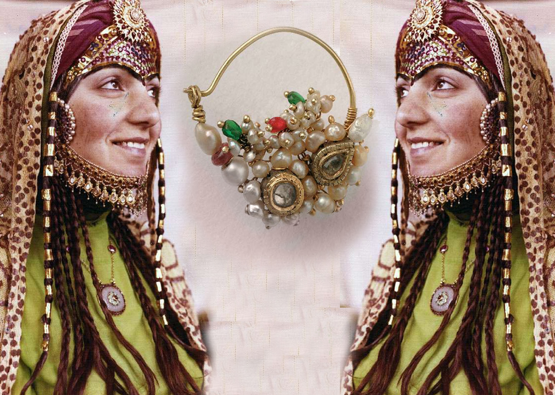 An afgani adorned Jewish bridge looks at her reflection with a nose ring between the images